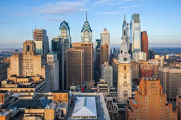 Philadelphia, Pennsylvania, USA downtown city skyline at dusk.